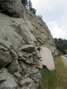 Road cut through steep mountain in Boulder Canyon