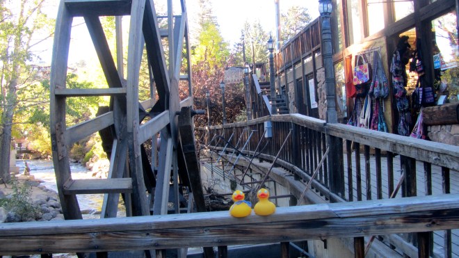 Soapy & Zeb by water wheel and Nepal shop