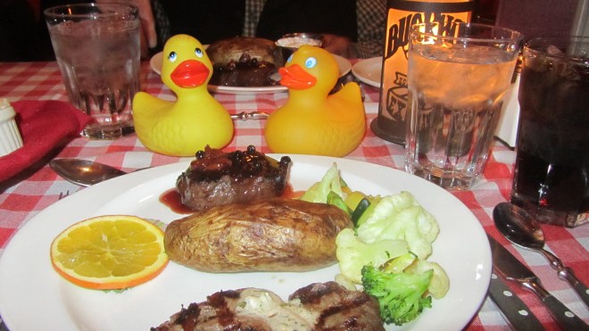 Elk at top of plate,then  baked potato, with buffalo closest to my human.  Yum!