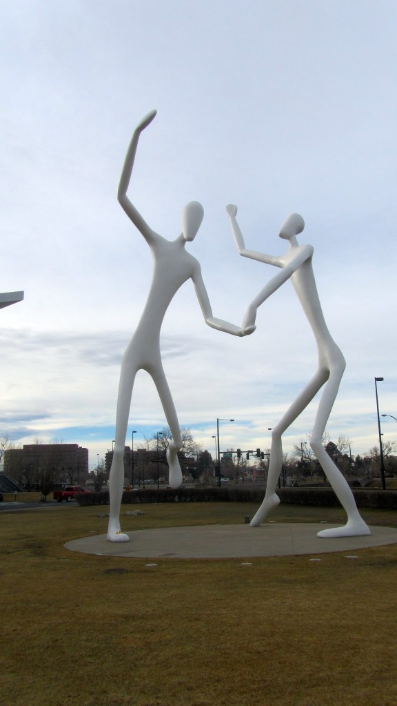 Soapy and Zeb on foot of tall dancers