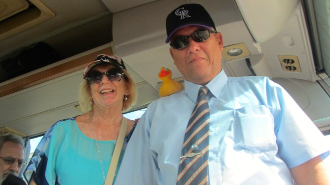 Connie our Friendly Planet guide and Santos our driver with Zeb the Duck