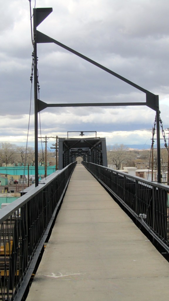 Long bridge to cross all the train tracks.