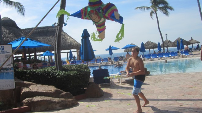 It won't be long before piñata is broken and candy falls to ground