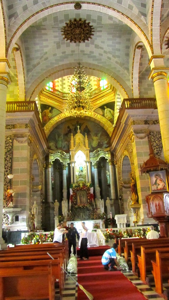 Ornate alter.   Flowers arriving now.