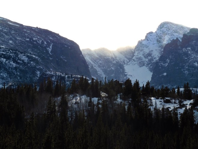 Snow swirling around the mountain peaks.