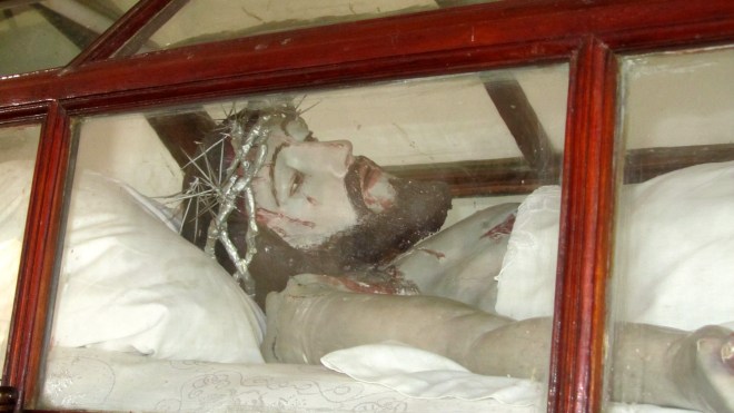 Wearing a crown of thorns