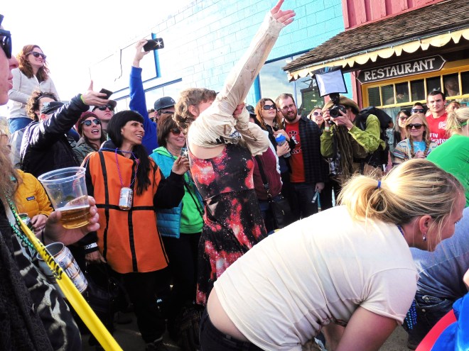 She is getting the t-shirt on