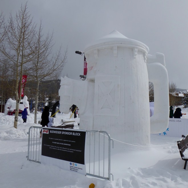 Busdweiser, the sponsor, presents this mug