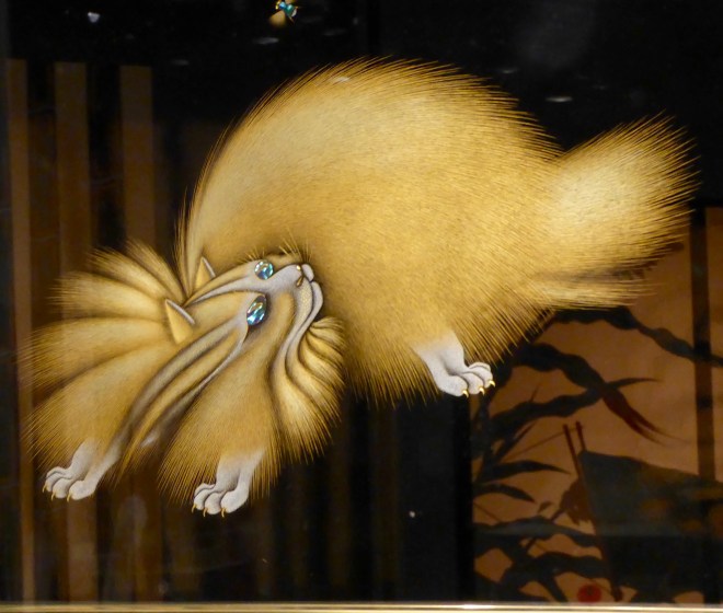 Persian cat with bumblebee