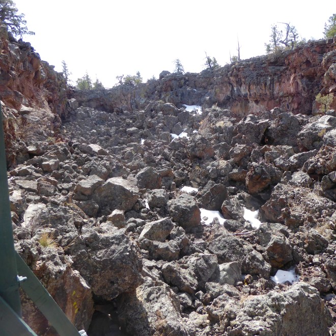 Lave tube with top collapsed. Stair railing on the left