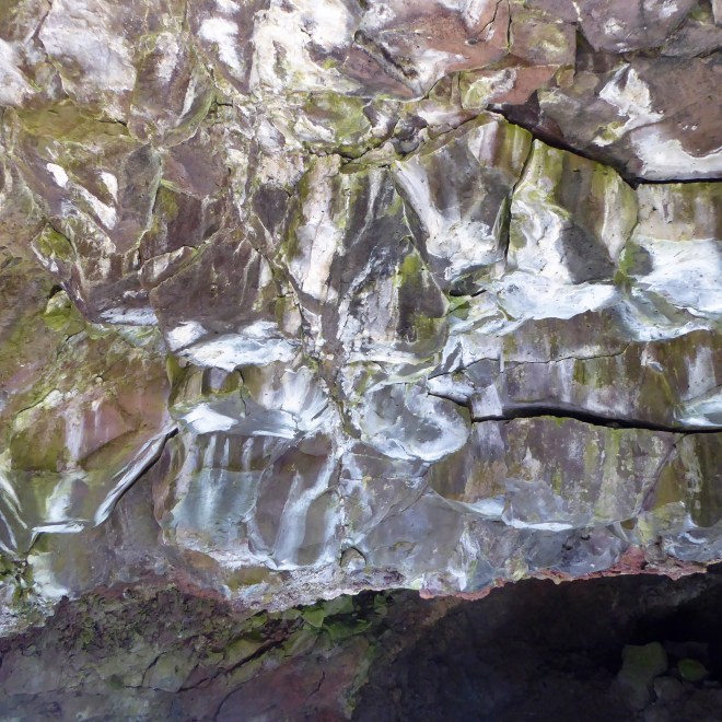 Colors reflect on ice and on rocks