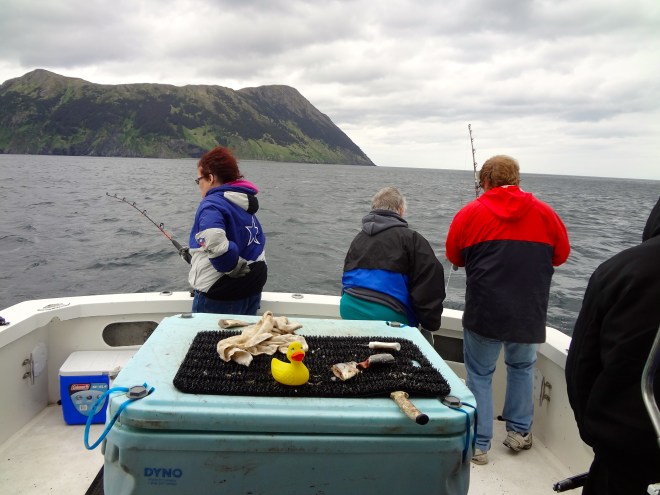 Humans fish and Eider supervises