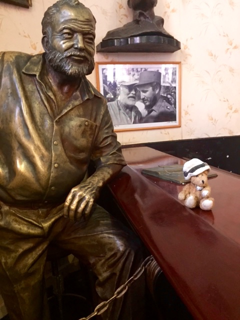 Channel with statue of Ernest Hemingway in El Floridita in Havana