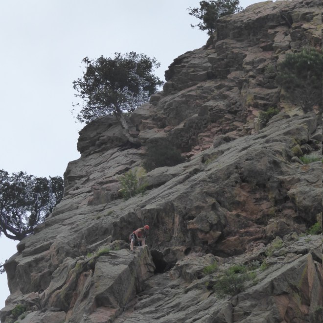 Human is climbing this rock