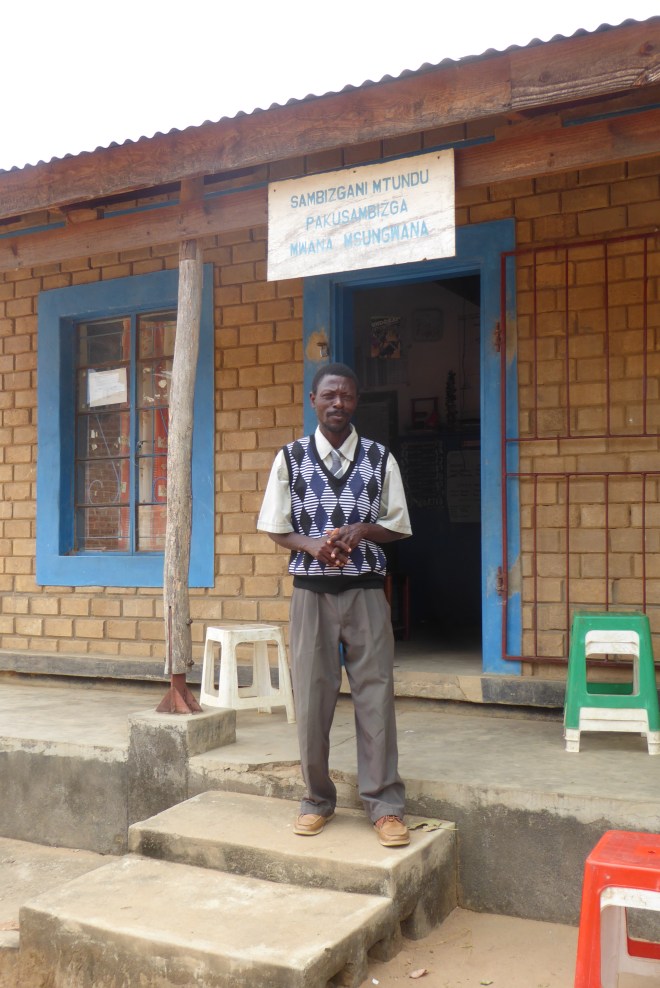 Preschool teacher in front of classroom