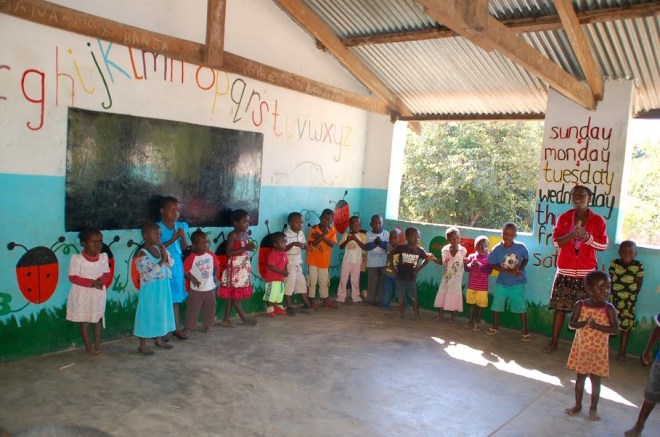 Large circle around classroom. Song and dancing time. 