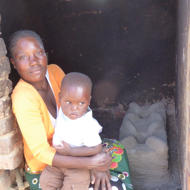Mother with her child by her new stove