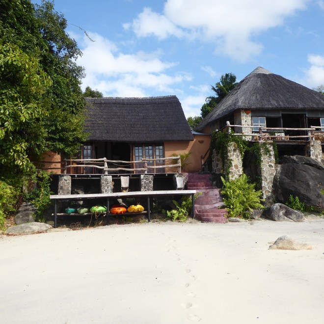 Restaurant over kayaks. Bar and lounge to the right