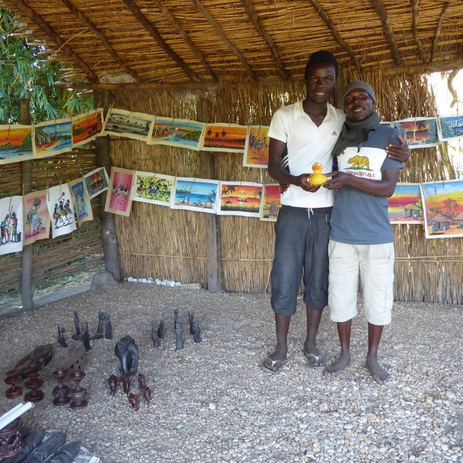Patrick and his cousin with Patrick's art