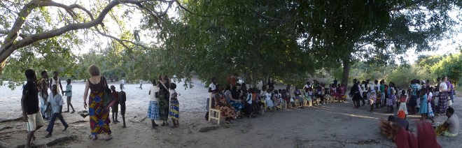 Many people on beach of Lake Malawi