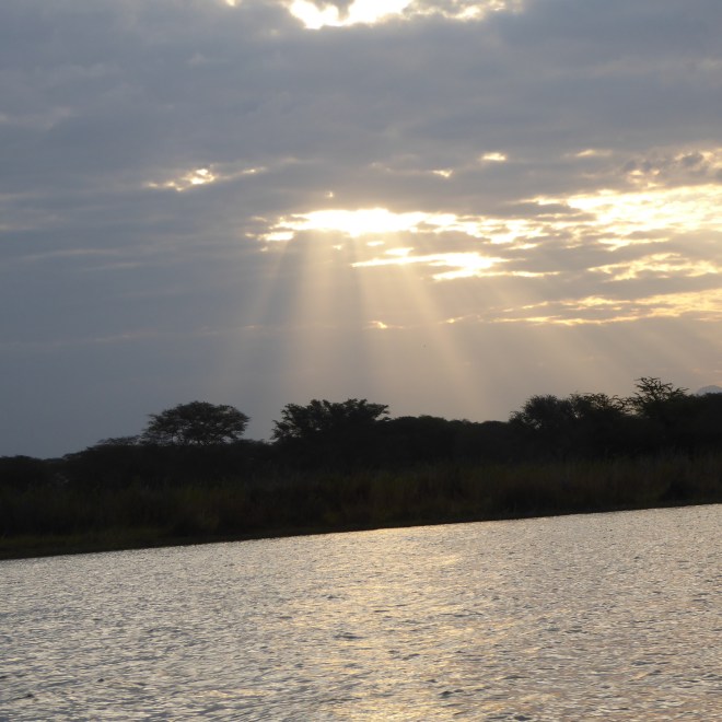 Rays of sun through clouds