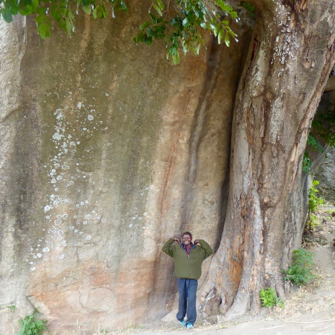 Rocks really tall. Our happy guide