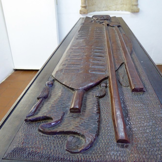 Carved coffin lid