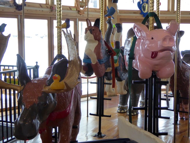 I am on the moose, near a pink flying pig.