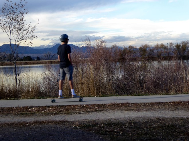 Skateboarding around the lake