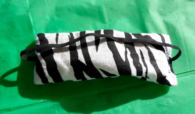 Eye mask filled with cherry pits